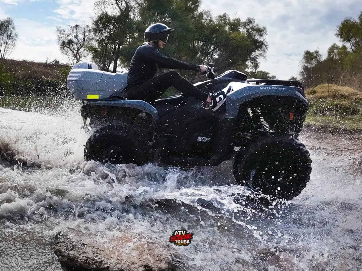 ATV crossing a stream on a tour around San Miguel de Allende.