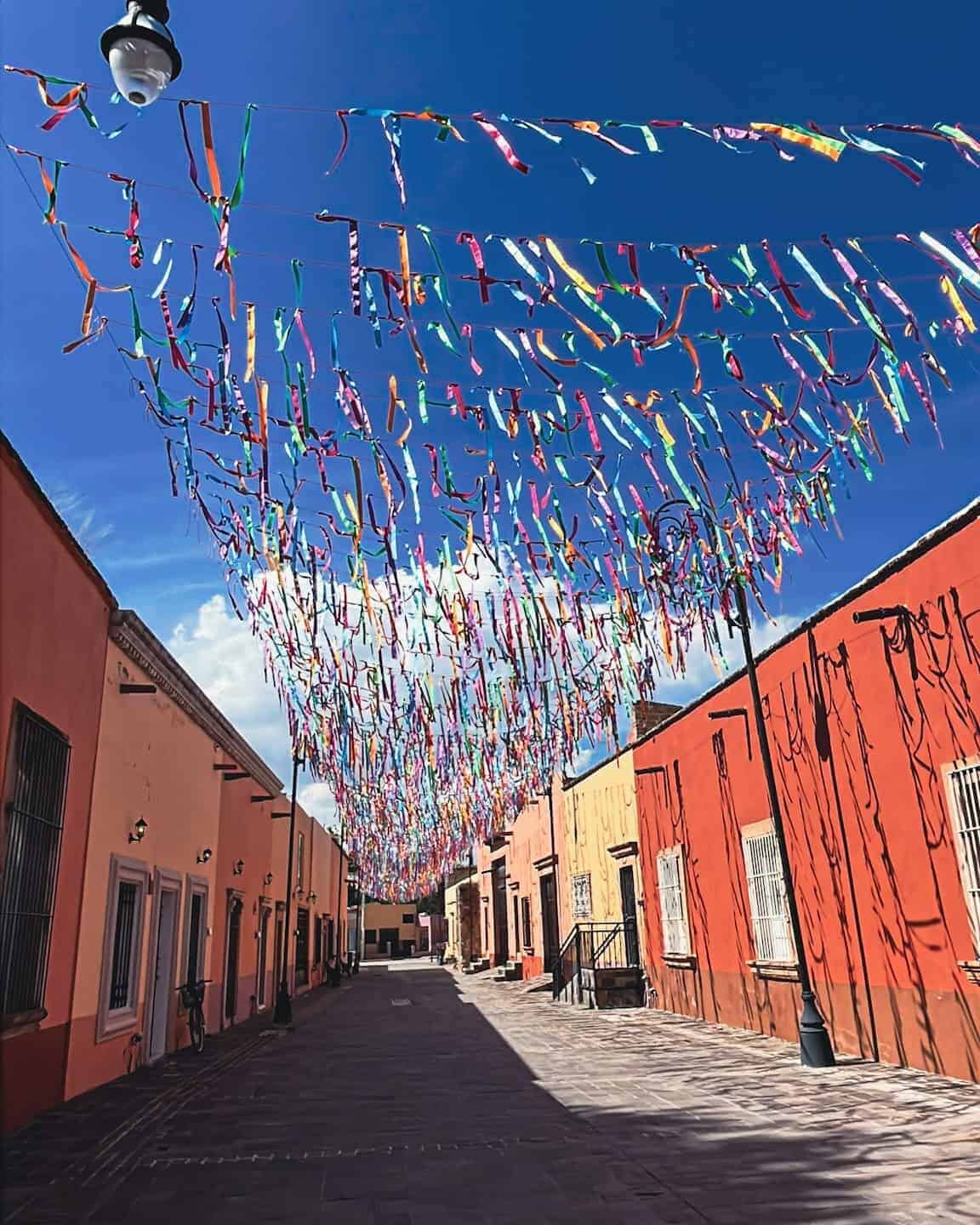 Colorful garlands decorate the streets of Jalpa de Canovas, a Magic Town full of charm and tra.