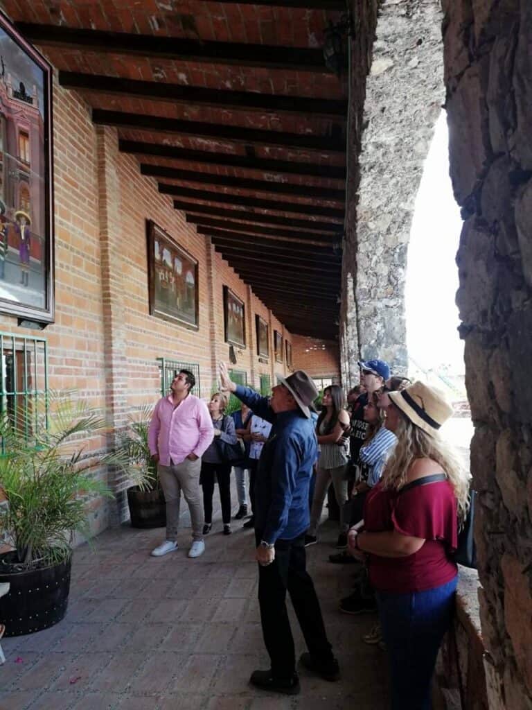 Distillery in Guanajuato, Mexico, with tourists enjoying local history and culture.