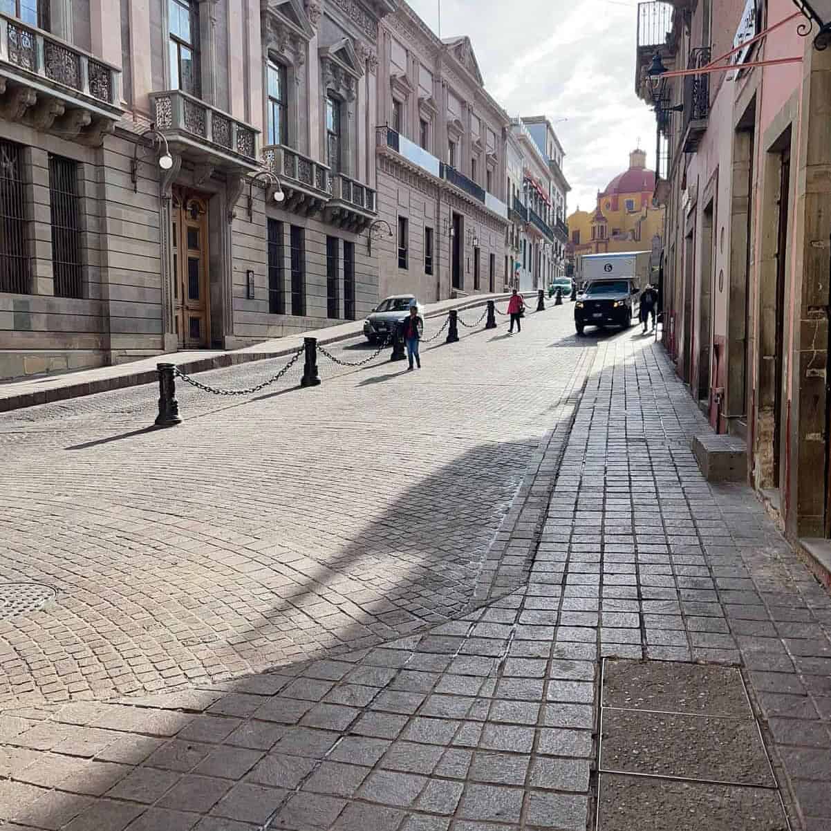 Cobblestone streets and colonial architecture in Guanajuato, a tourist destination in Mexico.