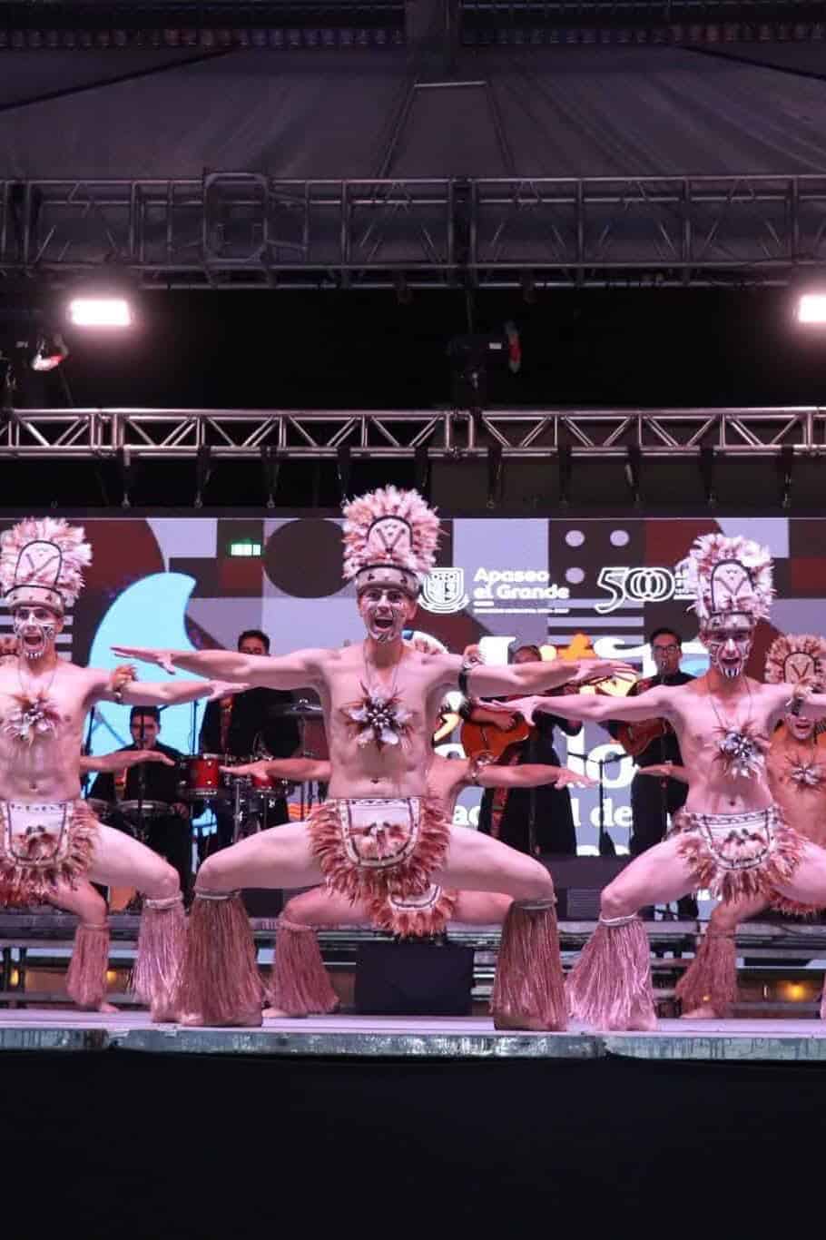 Traditional Mexican dance show in Guanajuato with dancers in colorful costumes on a sta.