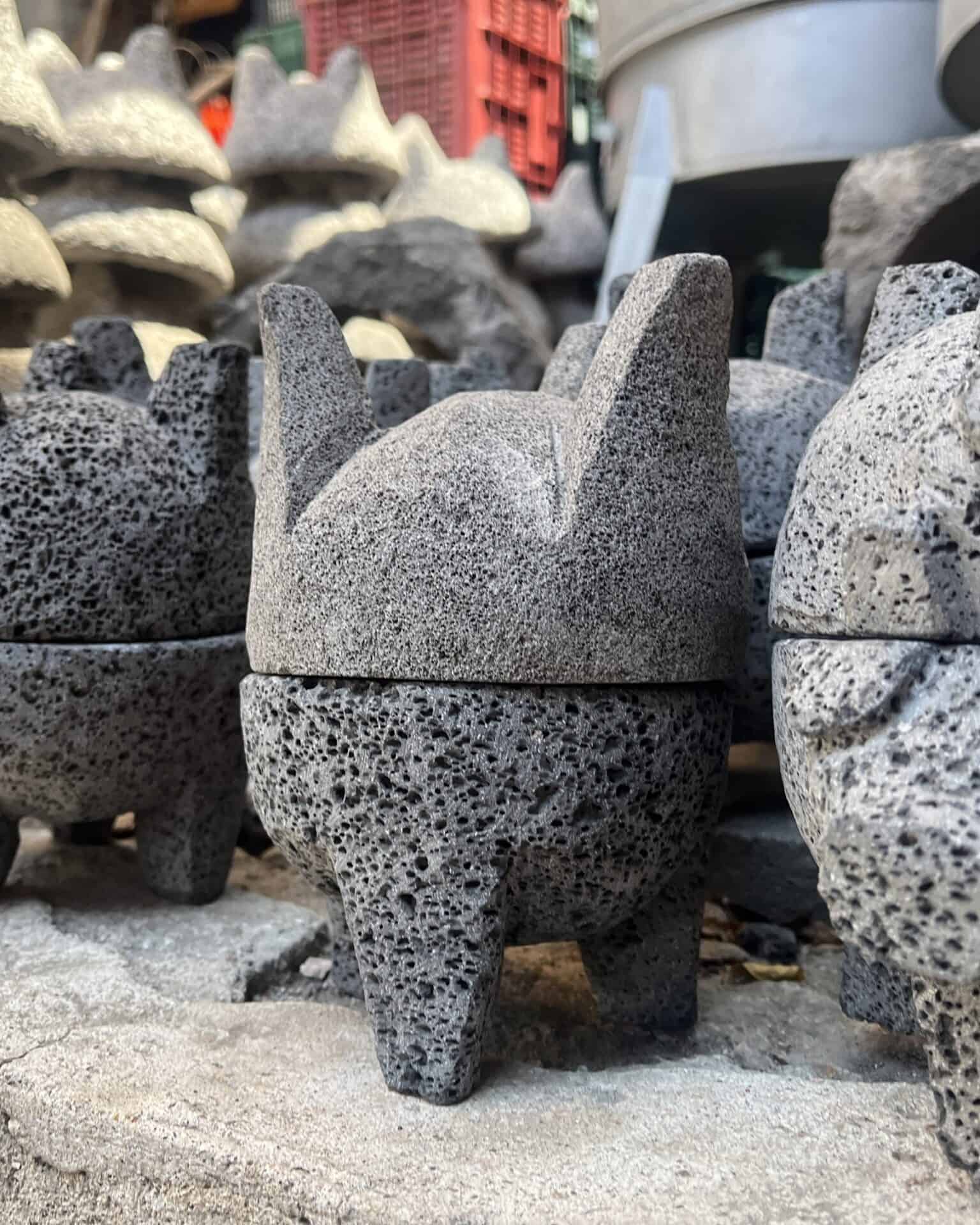 Traditional sculptures reflecting local culture and craftsmanship in a historic setting.