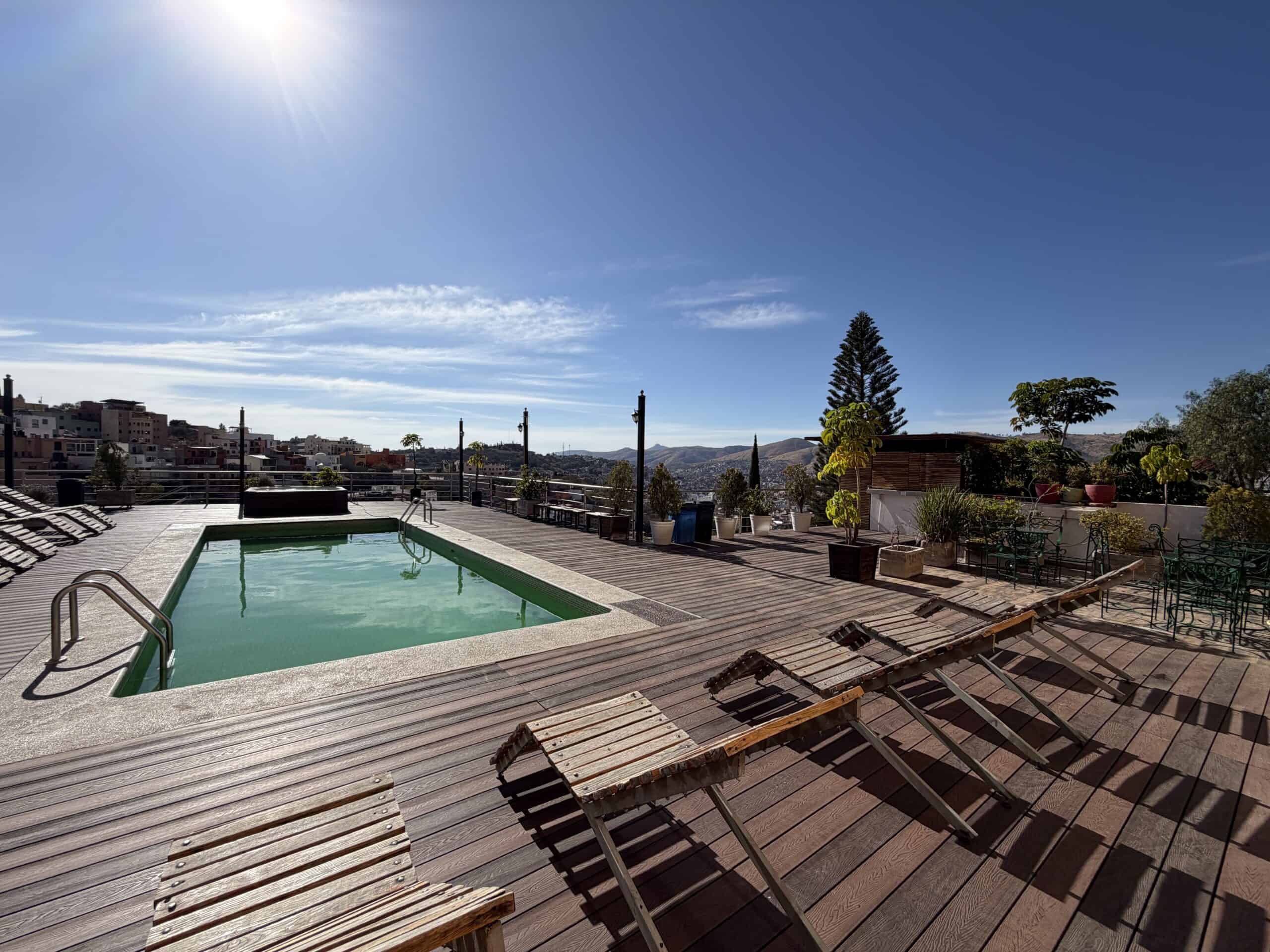 Swimming pool at Hotel Colonial 1988, Guanajuato, Mexico, with panoramic city views.