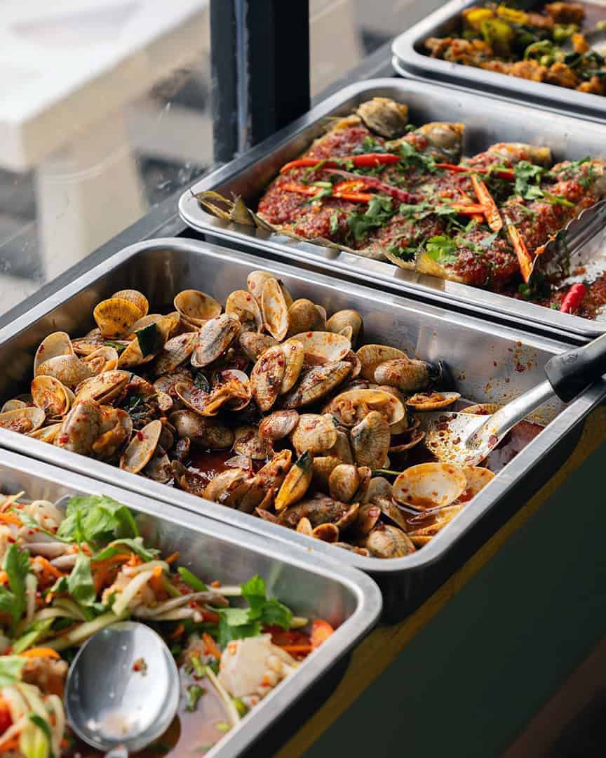 Variety of seafood and typical Guanajuato dishes in a buffet.
