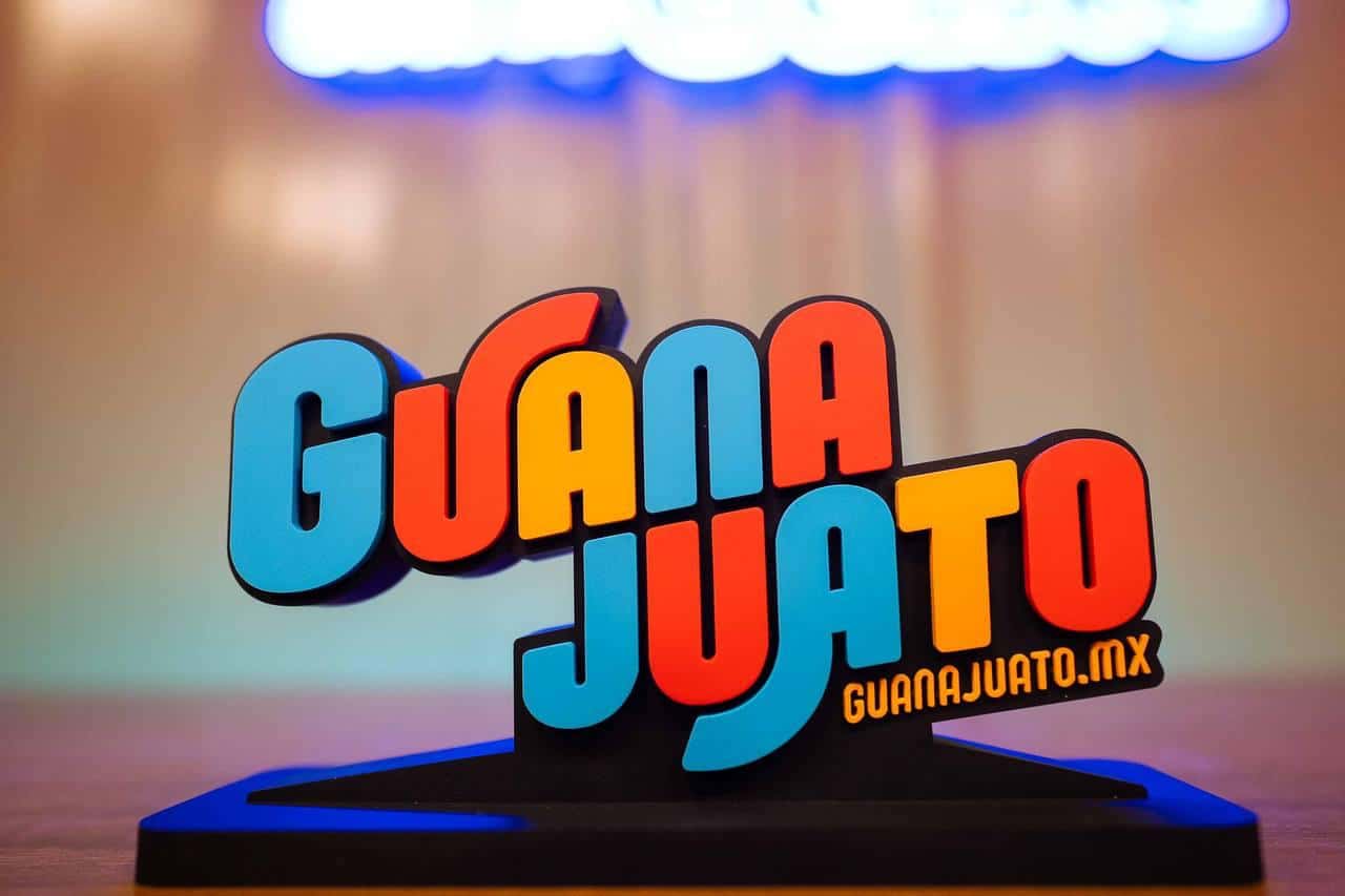 Guanajuato logo on display at tourism event in Mexico.
