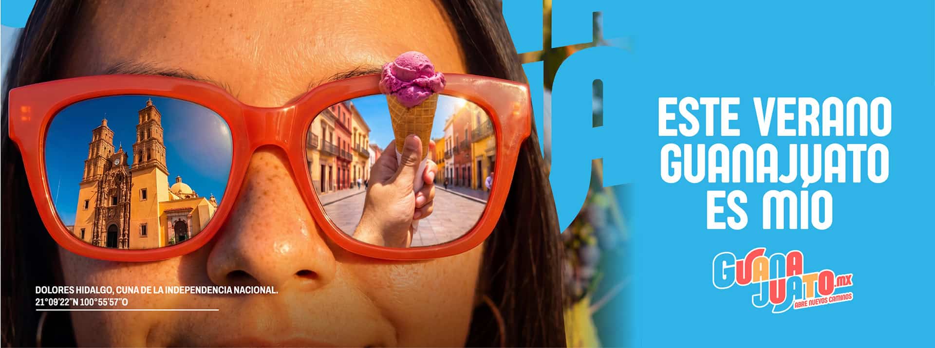 Mujer con gafas de sol reflejando calles de Guanajuato en verano.
