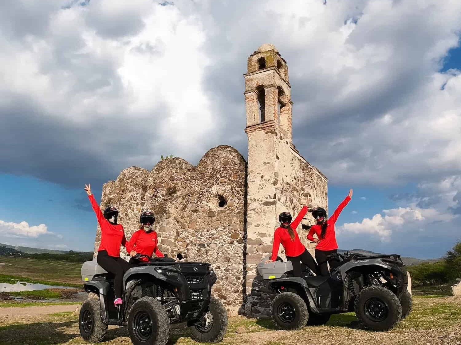 ATV group in front of the ruins of a stone chapel in the outskirts of San Miguel de Allende.