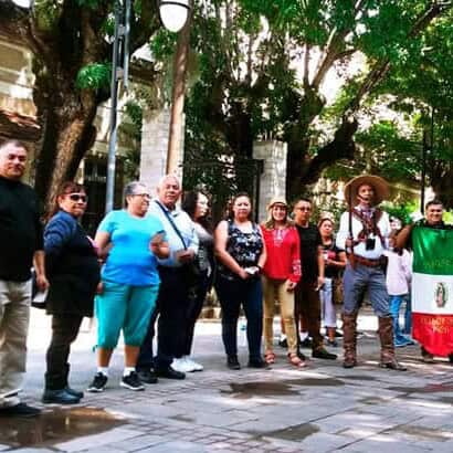 Group of tourists in Guanajuato enjoying a cultural tour.