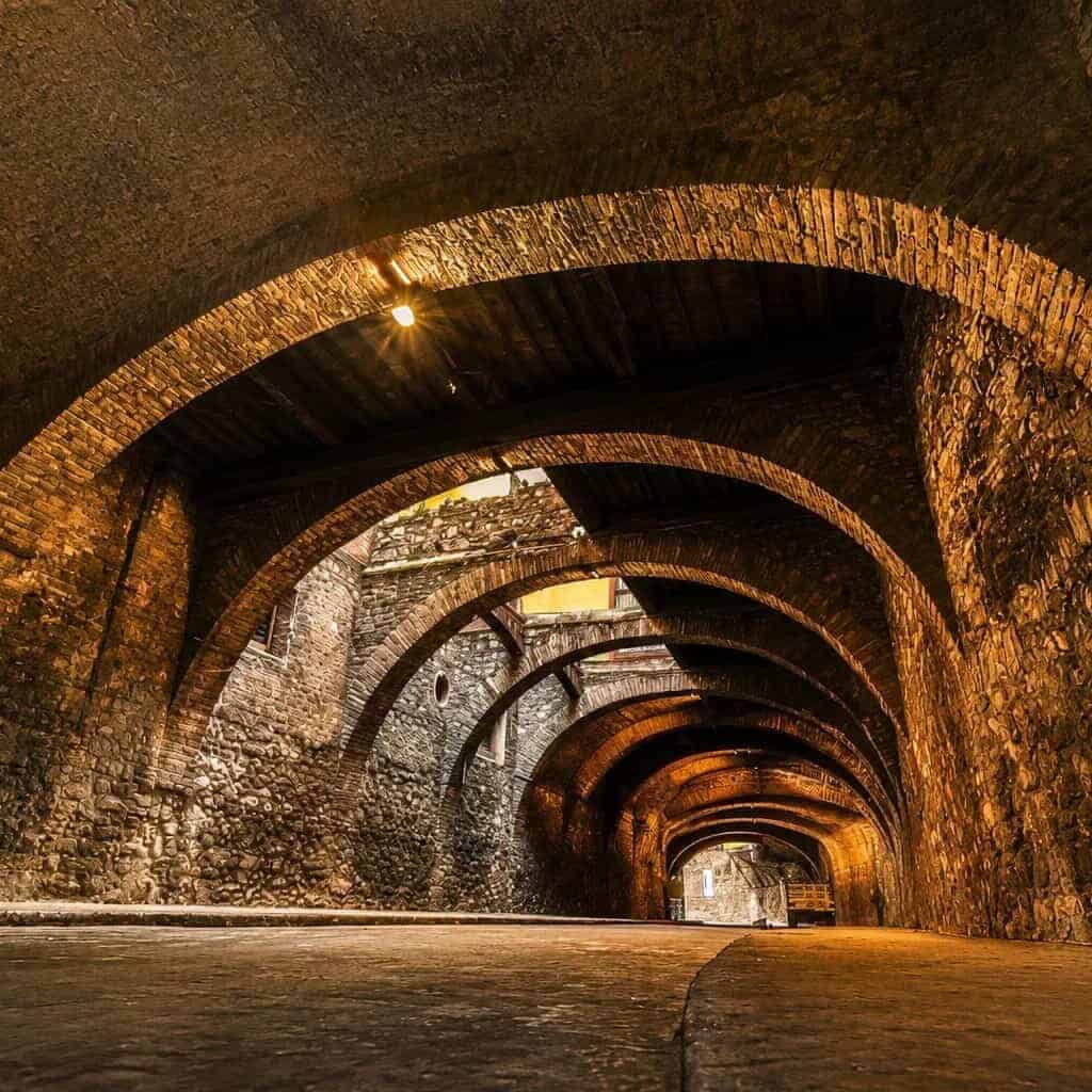 Illuminated underground stone tunnels in the city of Guanajuato.