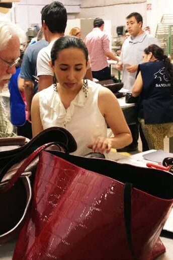 Visitors watch leather bags being made at a workshop in León, Guanajuato.