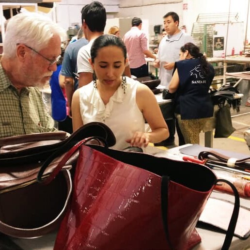 Visitors watch leather bags being made at a workshop in León, Guanajuato.
